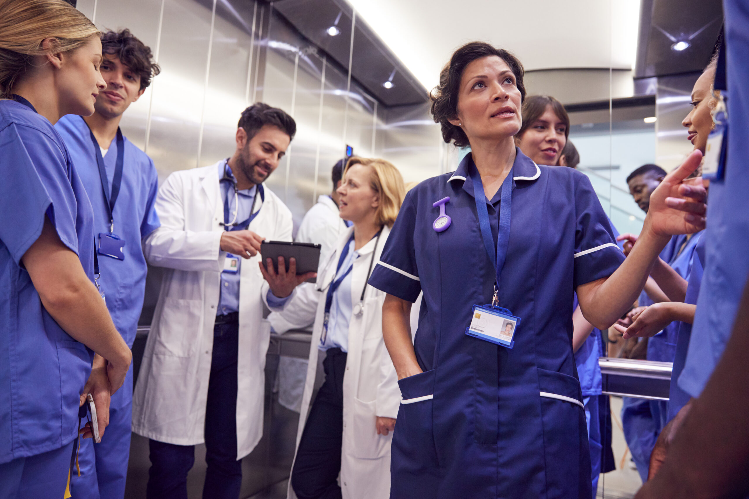 Medical Team In Hospital Elevator About To Perform Operation